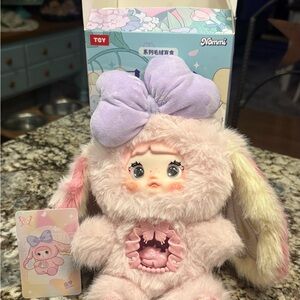 Nommi Plush Toy with Pastel Colors